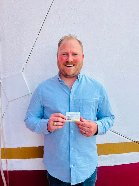 DNExpress client holding approved Mexican residency card