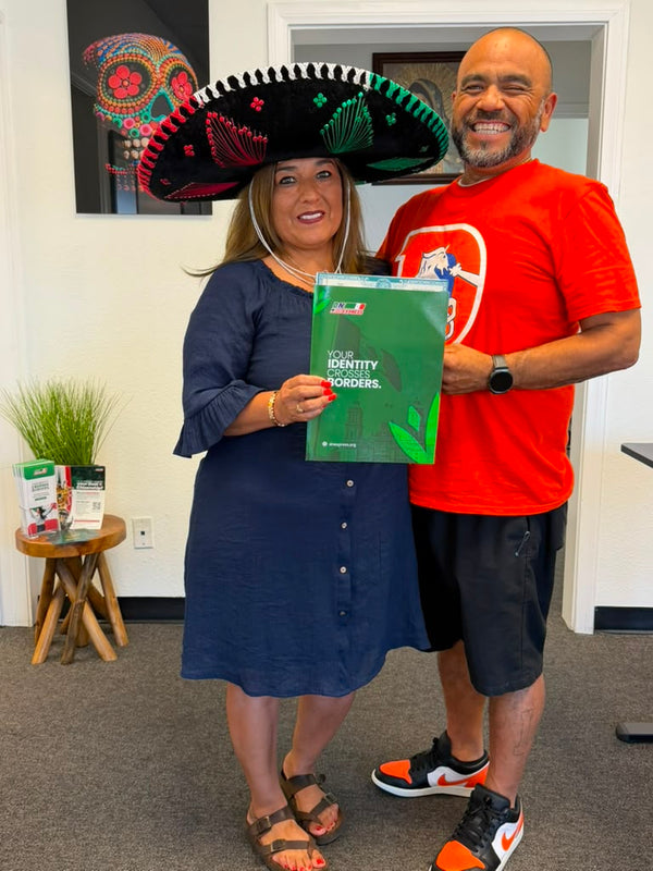 Mexican American couple in Los Angeles holding Mexican birth certificate after getting Mexican dual citizenship from home with DNExpress in 6 weeks